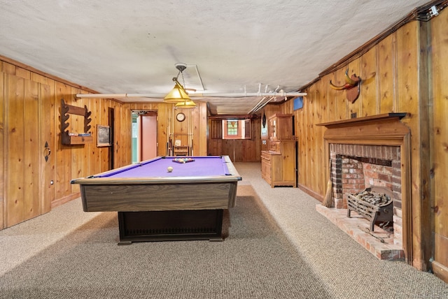 44 Walbridge Rd, West Hartford, CT 06119 - playroom featuring wood walls, light colored carpet, pool table, a fireplace, and a textured ceiling