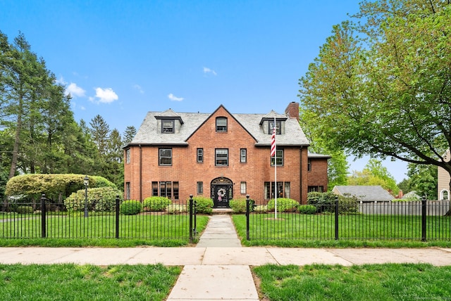 44 Walbridge Rd, West Hartford, CT 06119 - view of front facade with a chimney and brick siding