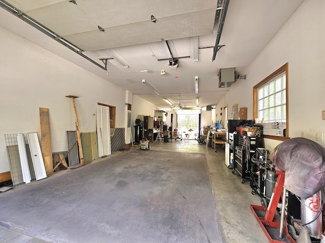 69 Elmdale Rd, Canterbury, CT 06331 - garage featuring a garage door opener