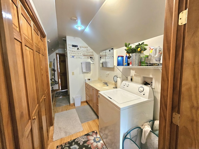 69 Elmdale Rd, Canterbury, CT 06331 - washroom with washer / dryer, cabinet space, and light wood finished floors