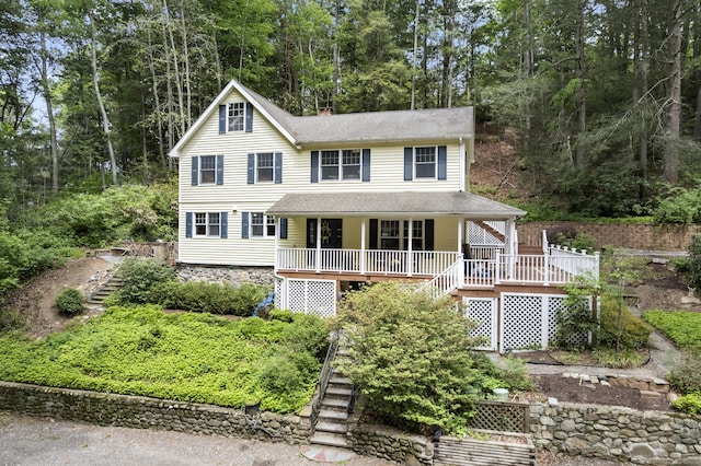 18 Brookside Trl, Monroe, CT 06468 - view of front facade with stairway, a chimney, a porch, and roof with shingles