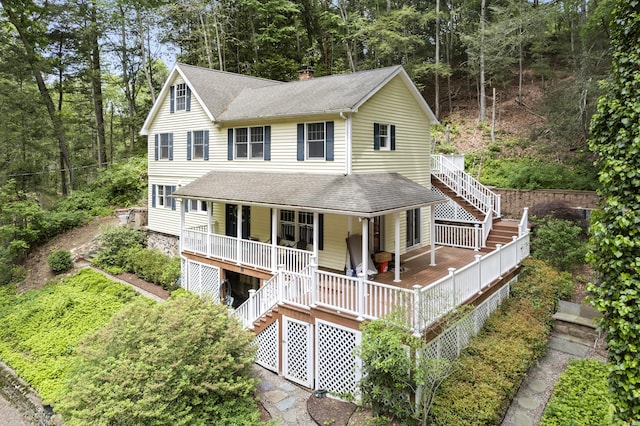 18 Brookside Trl, Monroe, CT 06468 - view of front facade featuring stairs, covered porch, and a shingled roof