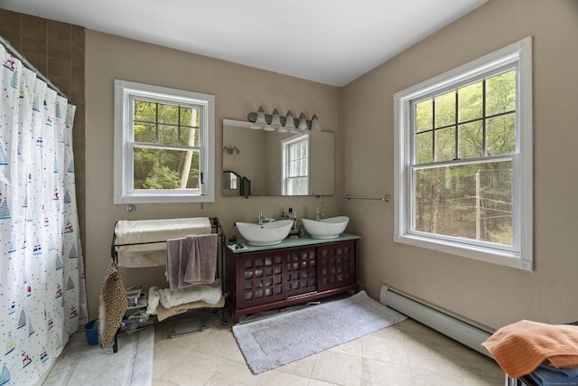 18 Brookside Trl, Monroe, CT 06468 - full bath featuring baseboard heating, double vanity, tile patterned floors, and a shower with curtain