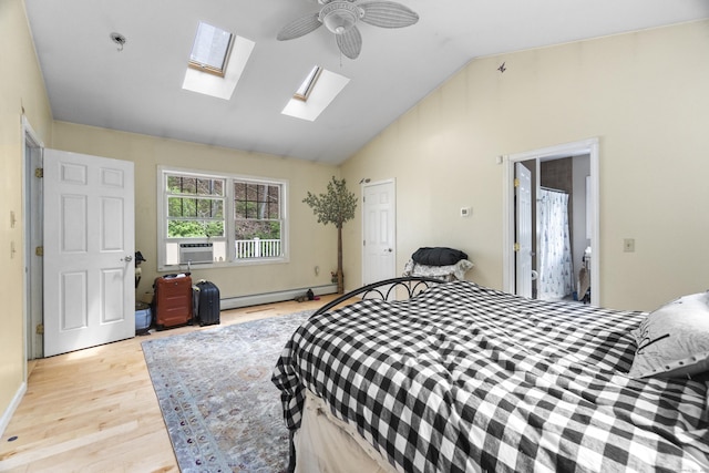 18 Brookside Trl, Monroe, CT 06468 - bedroom with a baseboard radiator, light wood finished floors, lofted ceiling, a skylight, and cooling unit