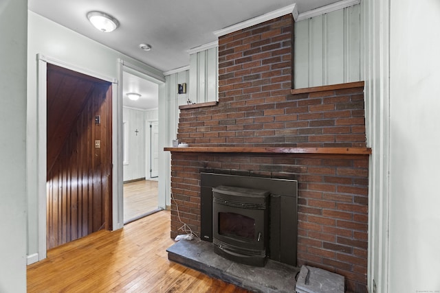 18 Brookside Trl, Monroe, CT 06468 - detailed view of a wood stove and wood finished floors