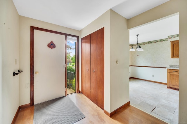 foyer entrance with baseboards