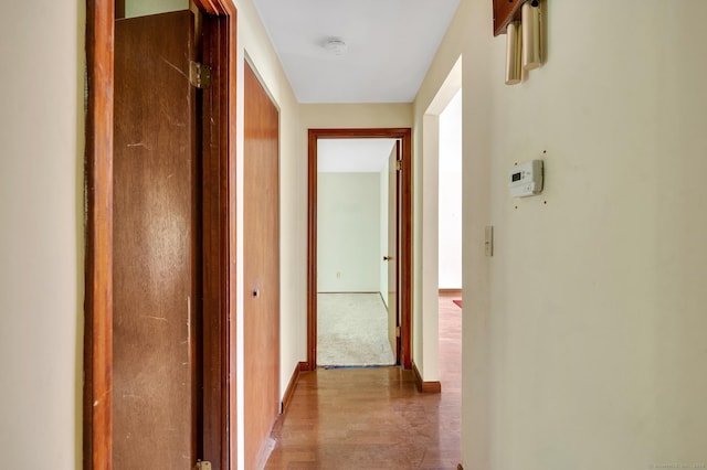 hall featuring wood finished floors