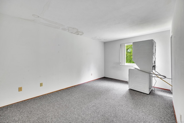 empty room with baseboards