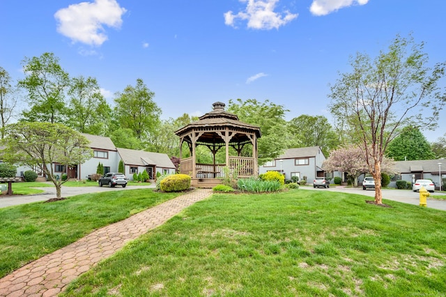 view of yard with a gazebo and a residential view