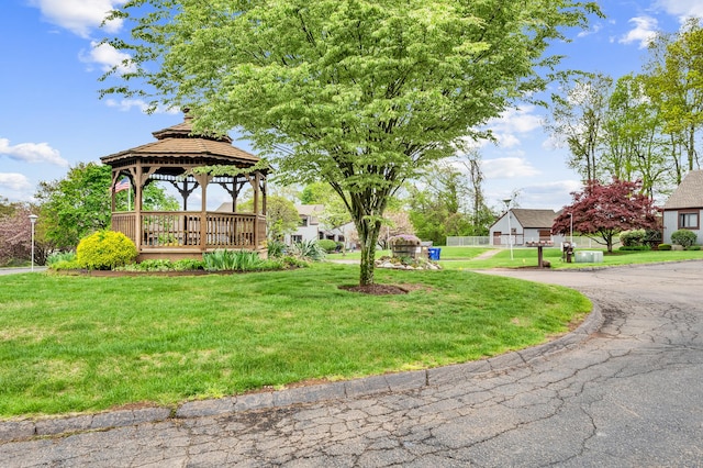 exterior space with a yard and a gazebo