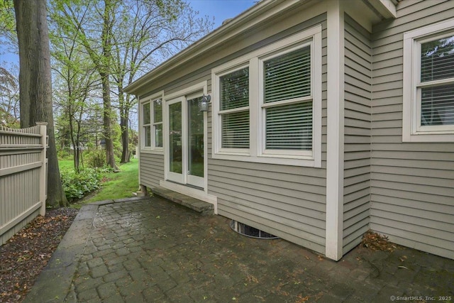 view of property exterior featuring a patio