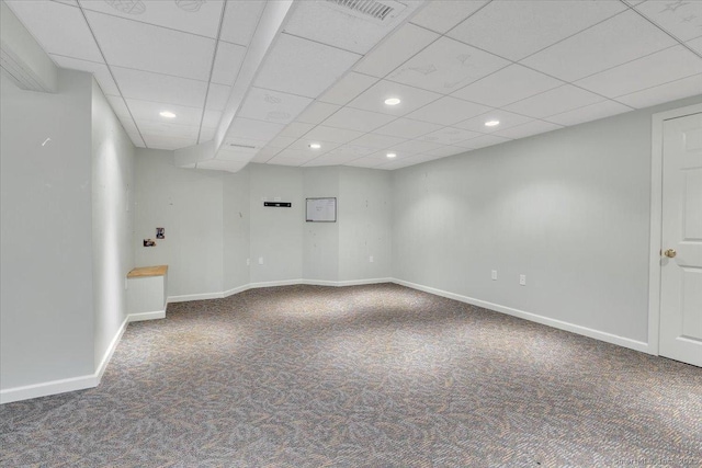 carpeted empty room with visible vents, baseboards, and recessed lighting