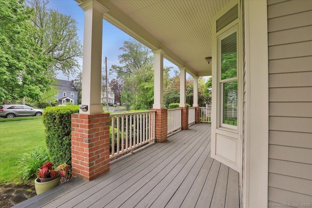 wooden deck featuring covered porch