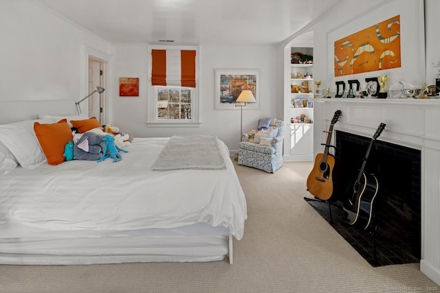 3113 Bronson Rd, Fairfield, CT 06824 - carpeted bedroom featuring a fireplace