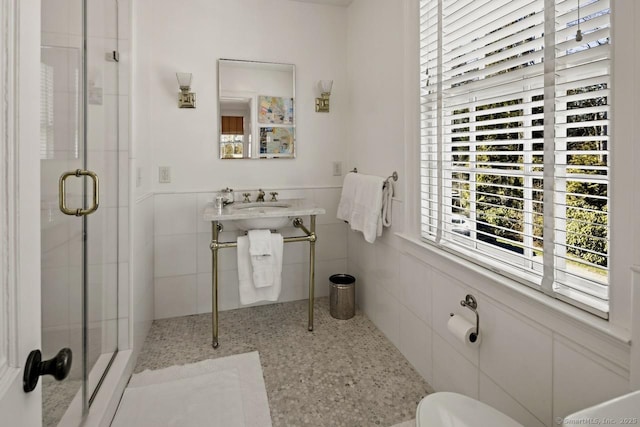 3113 Bronson Rd, Fairfield, CT 06824 - bathroom with a shower stall, tile walls, wainscoting, and toilet