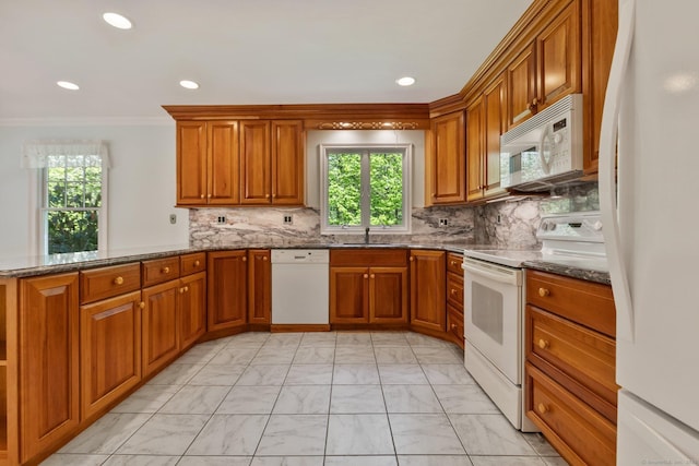 9 Brick School Dr, Redding, CT 06896 - kitchen featuring white appliances, light marble finish floors, brown cabinets, a peninsula, and recessed lighting