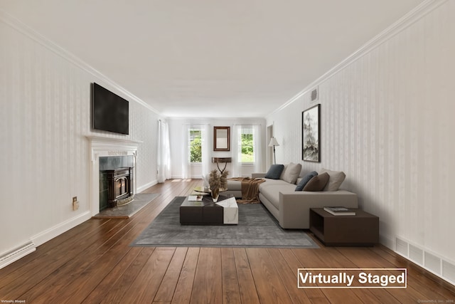 9 Brick School Dr, Redding, CT 06896 - living area with crown molding, a baseboard radiator, and dark wood-type flooring