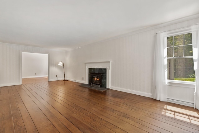 9 Brick School Dr, Redding, CT 06896 - unfurnished living room with crown molding and hardwood / wood-style flooring