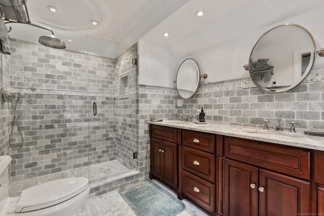9 Brick School Dr, Redding, CT 06896 - full bathroom with a stall shower, toilet, double vanity, and tile walls