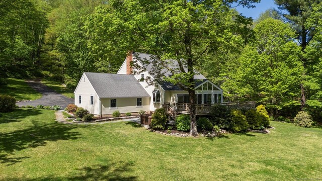 9 Brick School Dr, Redding, CT 06896 - rear view of house with a wooden deck, a yard, and a view of trees