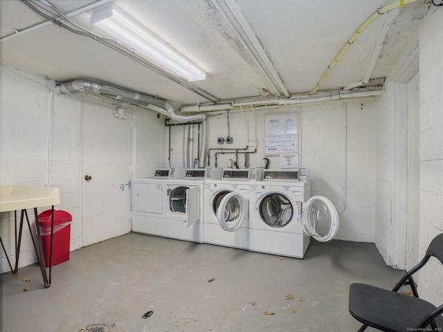 36 Courtland Ave Unit 3, Stamford, CT 06902 - shared laundry room featuring washing machine and clothes dryer and concrete block wall