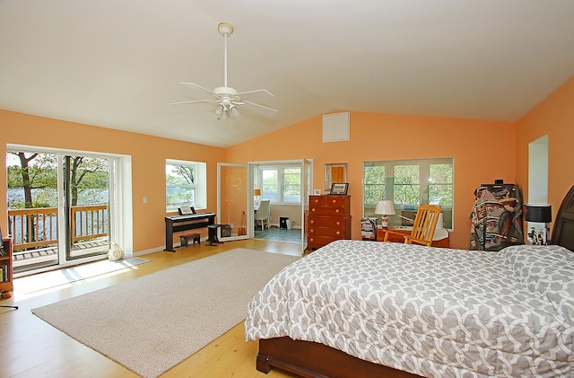 231 Lake Shore Dr, East Haddam, CT 06415 - bedroom with access to exterior, wood finished floors, lofted ceiling, ceiling fan, and baseboards