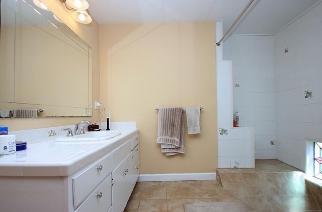231 Lake Shore Dr, East Haddam, CT 06415 - full bath featuring vanity, tiled shower, baseboards, and tile patterned floors