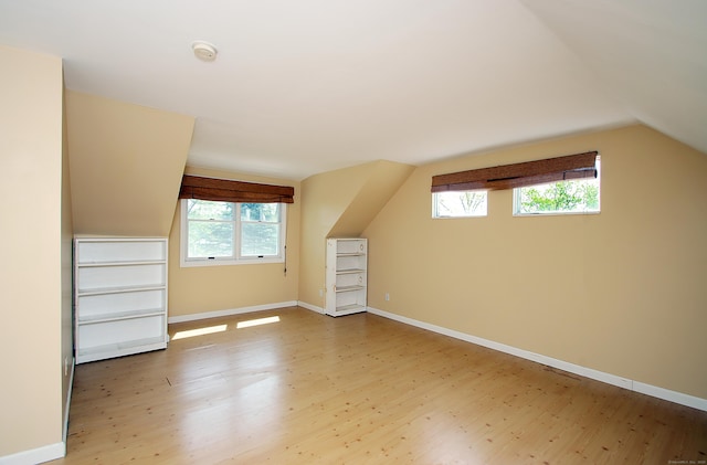231 Lake Shore Dr, East Haddam, CT 06415 - bonus room with wood finished floors, lofted ceiling, plenty of natural light, and baseboards