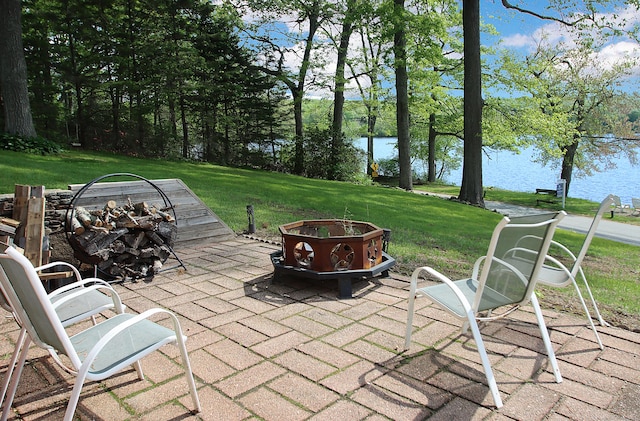 231 Lake Shore Dr, East Haddam, CT 06415 - view of patio / terrace with an outdoor fire pit and a water view