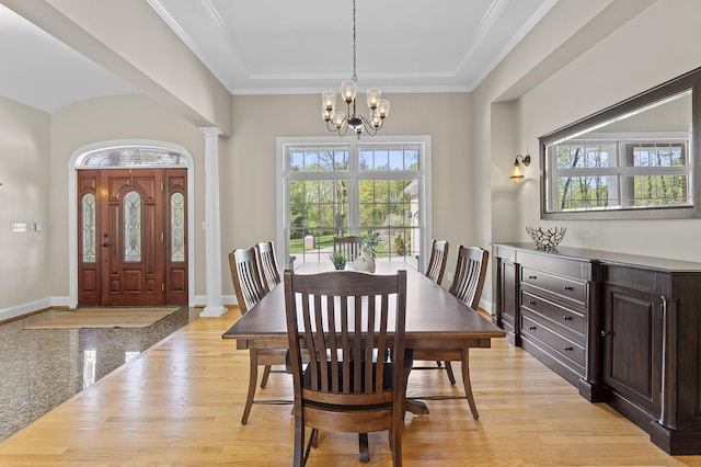 15 Hickory Hill Rd, Avon, CT 06001 - dining room featuring baseboards, a notable chandelier, light wood-style flooring, and plenty of natural light