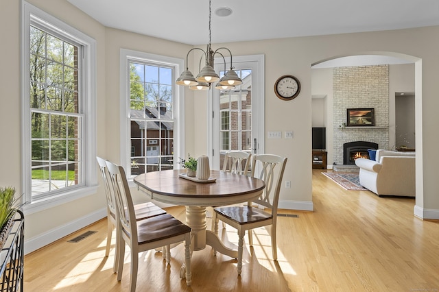 15 Hickory Hill Rd, Avon, CT 06001 - dining space with light wood-style floors, visible vents, baseboards, and a notable chandelier