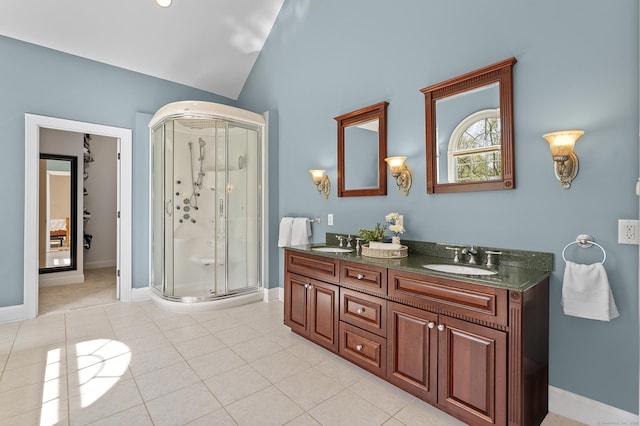 15 Hickory Hill Rd, Avon, CT 06001 - bathroom featuring a stall shower, lofted ceiling, tile patterned floors, and a sink