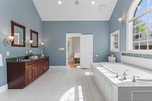15 Hickory Hill Rd, Avon, CT 06001 - full bath with a sink, tile patterned flooring, double vanity, baseboards, and a bath