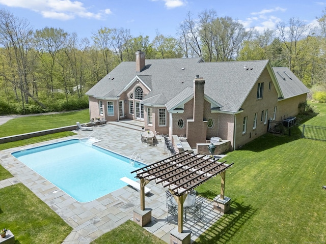 15 Hickory Hill Rd, Avon, CT 06001 - rear view of house with fence, a yard, a patio, a fenced in pool, and a chimney