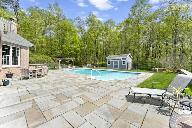15 Hickory Hill Rd, Avon, CT 06001 - view of swimming pool featuring an outbuilding, a pergola, a shed, a patio area, and a fenced in pool
