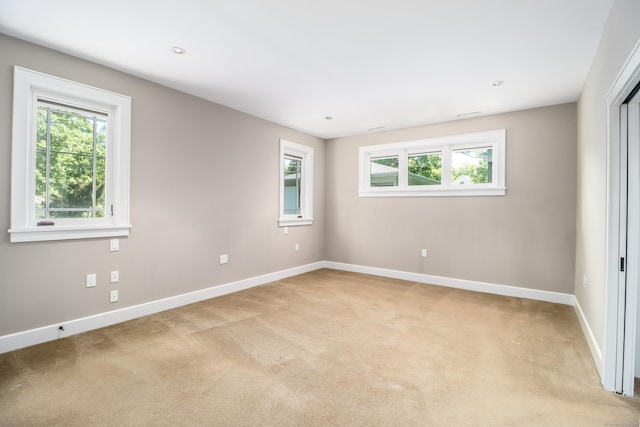 13 Kellogg St, Brookfield, CT 06804 - empty room featuring light carpet, healthy amount of natural light, and baseboards