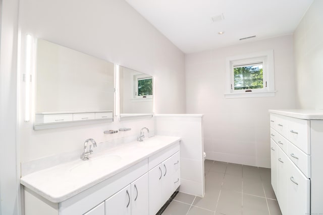 13 Kellogg St, Brookfield, CT 06804 - bathroom with double vanity, tile patterned flooring, and toilet