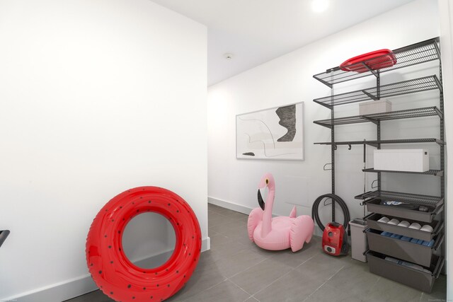 13 Kellogg St, Brookfield, CT 06804 - recreation room with tile patterned flooring and baseboards