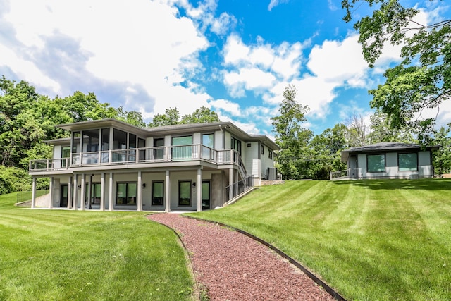 13 Kellogg St, Brookfield, CT 06804 - back of house with a sunroom and a lawn