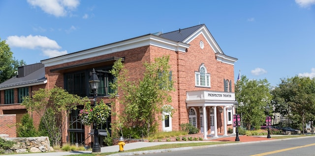 view of home's exterior featuring brick siding