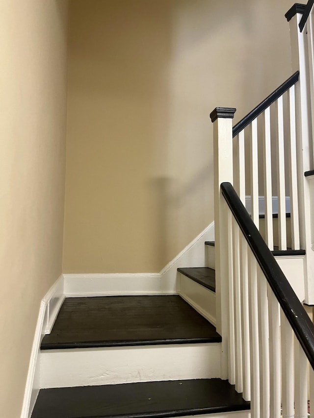 staircase with baseboards