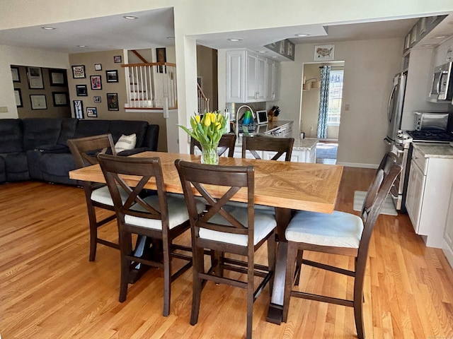 92 Sherwood Ln, Norwich, CT 06360 - dining room with light wood-type flooring, baseboards, and recessed lighting