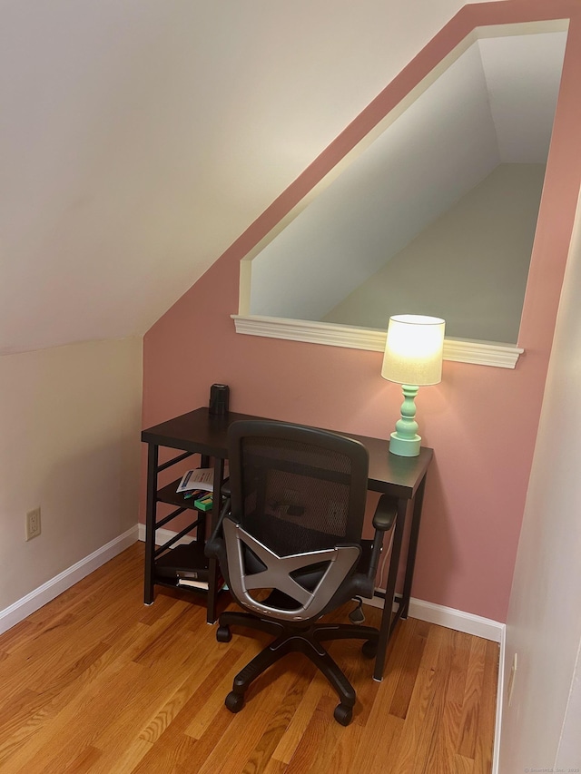 92 Sherwood Ln, Norwich, CT 06360 - office space featuring vaulted ceiling, wood finished floors, and baseboards