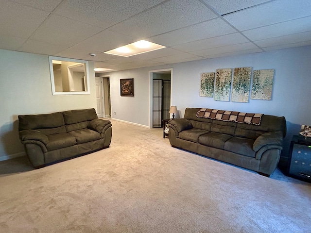 92 Sherwood Ln, Norwich, CT 06360 - living room featuring carpet, a paneled ceiling, and baseboards