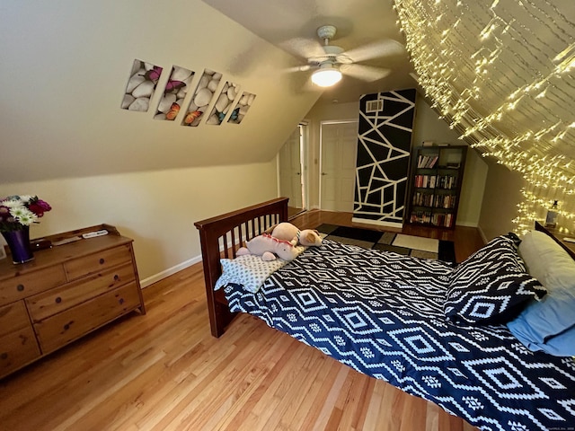 92 Sherwood Ln, Norwich, CT 06360 - bedroom featuring wood finished floors, vaulted ceiling, and baseboards