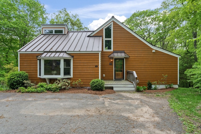 27 Whippoorwill Ln, Bethany, CT 06524 - view of front of home featuring a standing seam roof and metal roof