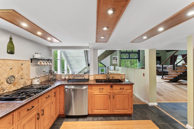 27 Whippoorwill Ln, Bethany, CT 06524 - kitchen with gas cooktop, a sink, dark stone counters, decorative backsplash, and recessed lighting