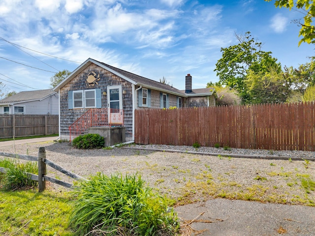 49 Hartford Ave, Old Saybrook, CT 06475 - view of front of house with a chimney