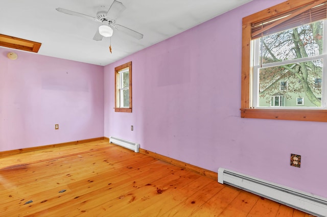 49 Hartford Ave, Old Saybrook, CT 06475 - unfurnished room with baseboard heating, a baseboard radiator, baseboards, light wood-style floors, and ceiling fan