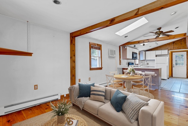 49 Hartford Ave, Old Saybrook, CT 06475 - living room featuring a baseboard heating unit, plenty of natural light, a skylight, light wood finished floors, and recessed lighting